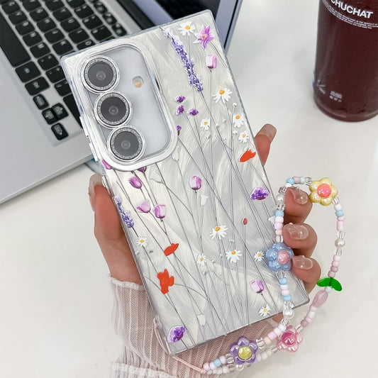 For Samsung Galaxy S25+ 5G Electroplating Flower Texture Wristband TPU Phone Case(Purple Wildflowers SH1) - Galaxy S25+ 5G Cases by PMC Jewellery | Online Shopping South Africa | PMC Jewellery | Buy Now Pay Later Mobicred